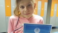 Настя Гончарова завоевала "серебро" на Первых областных соревнованиях по плаванию среди инвалидов